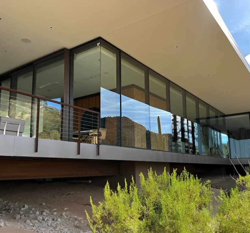 Cable-rail glass balcony cleaned on a modern Arizona hillside home