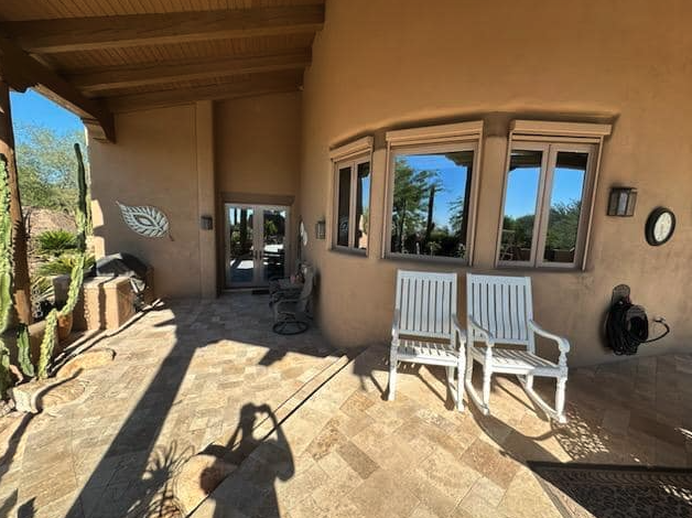 Bay windows cleaned on a Southwestern-style stucco home